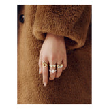 Qeelin Wulu mini solitaire ring in 18K yellow gold set with diamonds
