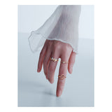Qeelin Wulu mini solitaire ring in 18K yellow gold set with diamonds