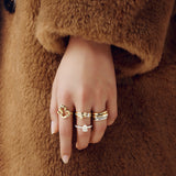 Qeelin Wulu mini solitaire ring in 18K yellow gold set with diamonds