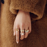 Qeelin Wulu mini solitaire ring in 18K yellow gold set with diamonds